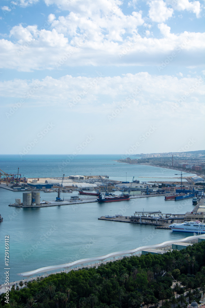 Fototapeta premium Aerial view of a busy port and coastline