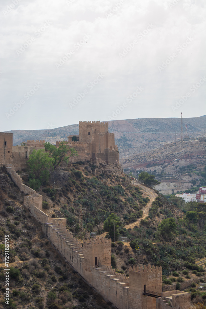 Fototapeta premium Historic castle on a hill with winding path