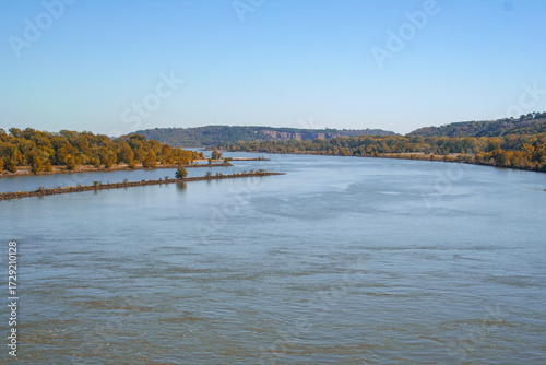 Autumn on the bridge over the arkansas river in little rock