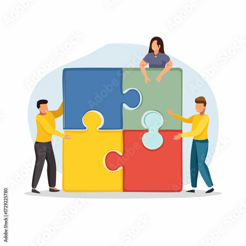 Diverse colleagues putting together a giant jigsaw puzzle, an illustration of successful teamwork and business collaboration