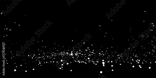 Black and white abstract background with falling snow and shiny particles like stars on a rainy night
