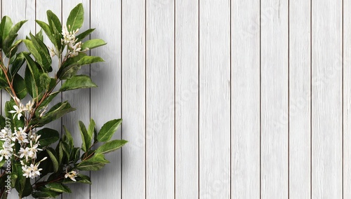 Fresh, delicate blossoms atop a light, wooden surface create a tranquil and serene scene.