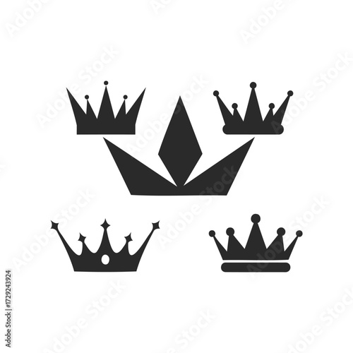 Variety of black crown silhouettes on white background