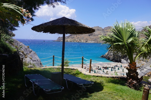 paradisiacal beach with umbrellas