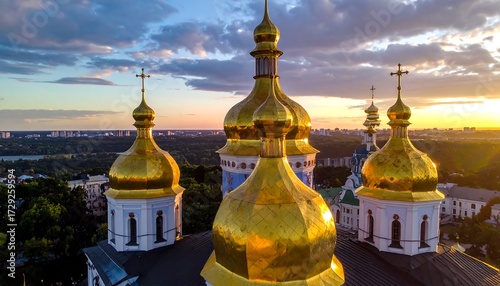Golden domes of a cathedral at sunset