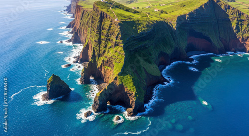 Dramatic Coastal Cliffs Lush Greenery Meets Azure Ocean Waves