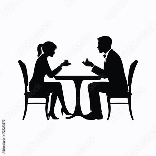 Silhouette of a man proposing to a woman at a table with a ring couple proposal