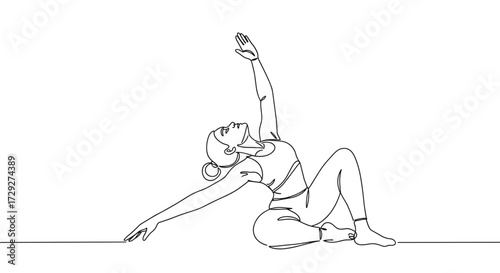 Young woman practicing yoga in a flowing pose with a serene expression  