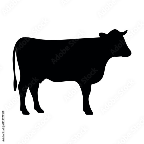 A stark black silhouette of a standing cow with horns against a white background