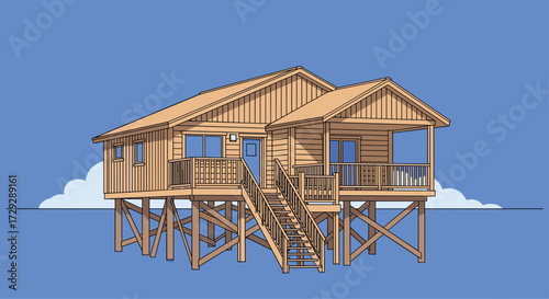 A wooden house on stilts surrounded by blue water and sky.