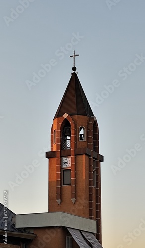 Church steeple against the blue sky in the city of Gdansk, Poland.