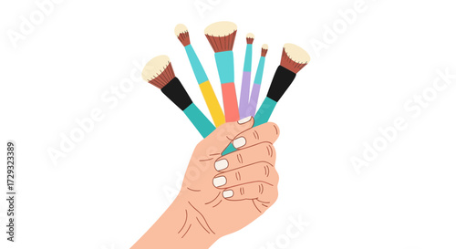 Elegant hand holding cosmetic brushes in a variety of vibrant colors