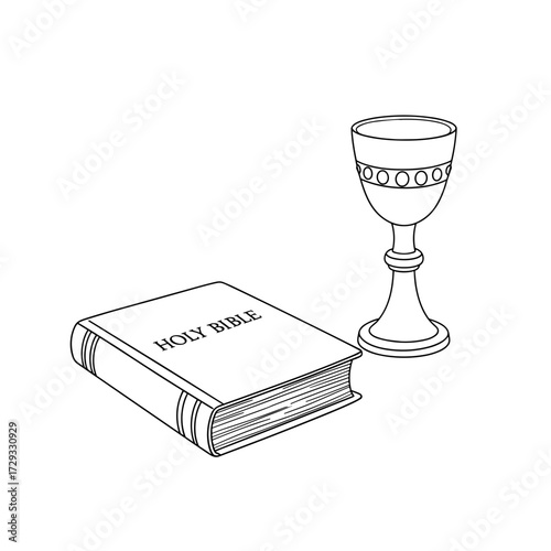 Holy Bible placed next to a decorative chalice on a plain background  