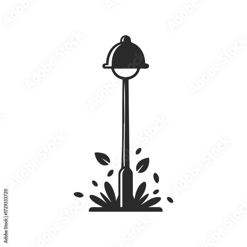 Silhouette of vintage street lamp with grass and leaves on white background