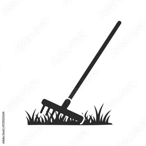 Silhouette of gardening rake with grass on white background