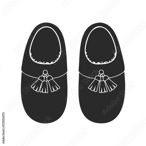Black moccasins with tassels on white background