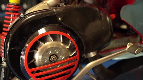 Close-up detail of a custom scooter engine flywheel