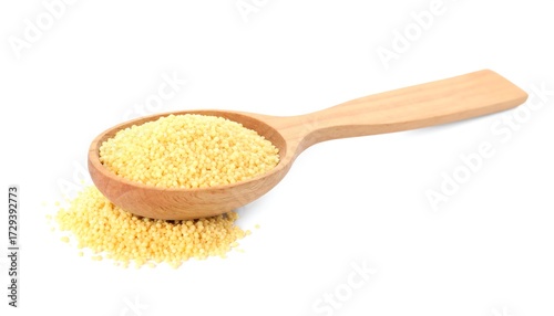 Small, pale yellow grains in wooden spoon