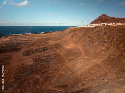 The residential buildings  built on the top of volcanic hill in Las Palmas de Gran Canaria, Spain