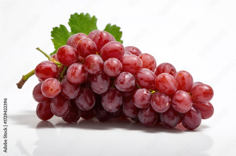 Fototapeta premium Cluster of crimson grapes on a white background