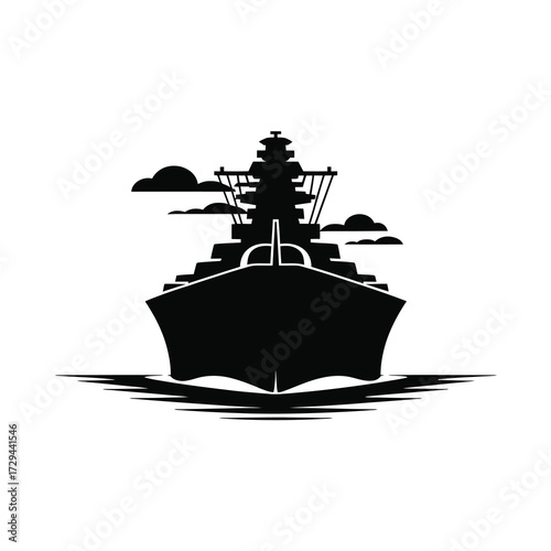 Striking silhouette of a powerful warship at sea under cloudy skies