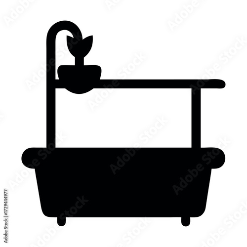 Elegant Black Bathtub Silhouette Featuring a Stylish Plant Shelf Showcasing Home Decor and Bathroom Fixture Design