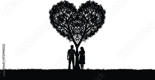 Couple Standing Under Heart-Shaped Tree Silhouette.