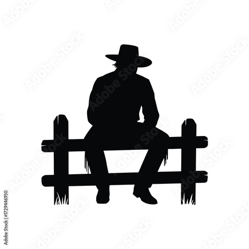 Lone cowboy silhouette sitting on a rustic fence at dusk