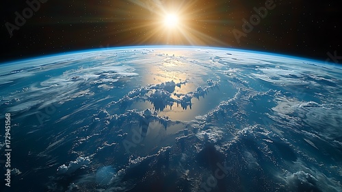 Stunning sunrise illuminates Earth's atmosphere and vast oceans, inspiring awe and wonder from the edge of space