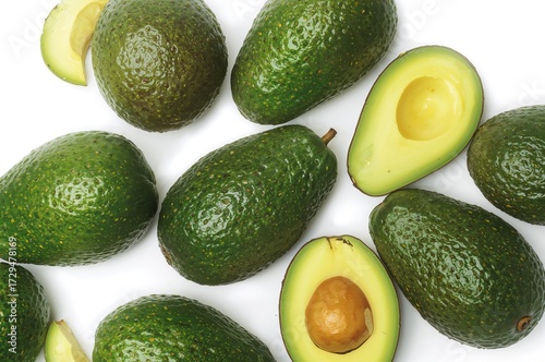 Isolated ripe avocados on a...