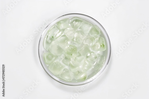 Clear aloe gel displayed in...