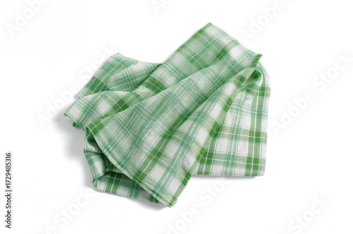 Folded green checkered fabr...