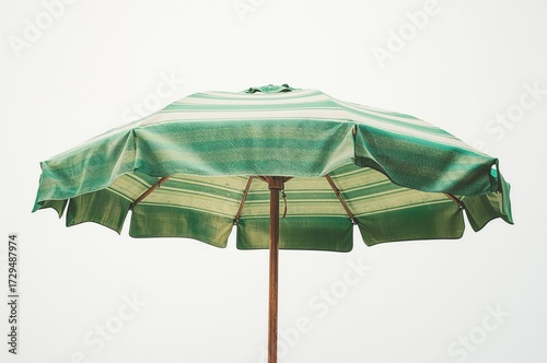 Isolated green beach umbrel...