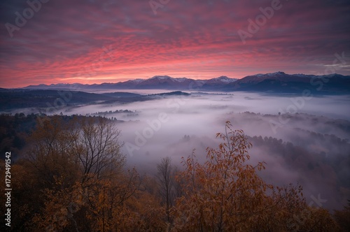 Red sky at dawn blankets a ...