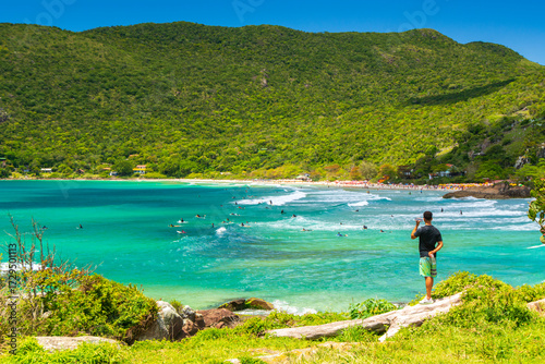 Watching the Surf At Matadeiro Beach from Armação Beach in Florianópolis, Santa Catarina Brazil