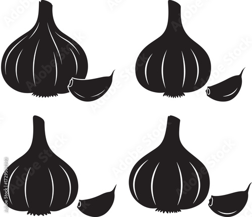 Four black garlic bulbs and cloves silhouette isolated on white background