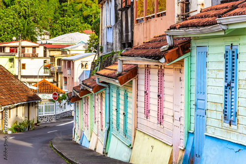 Bild auf Leinwand Colorful houses in Grande Riviere, Martinique, France, along General Charles de Gaulle Avenue