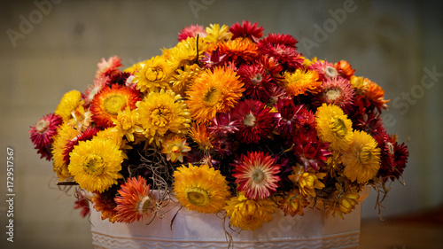 Red and yellow flowers in the pot