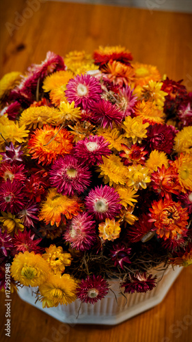 Red and yellow flowers in the pot