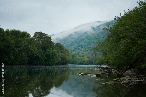 Misty clouds hover over the fall foliage along the Juniata River in Southern Pennsylvania