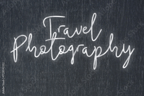 A blackboard with a handwritten chalk message that says travel photography, a powerful symbol of business success and motivation in educational and production concepts.