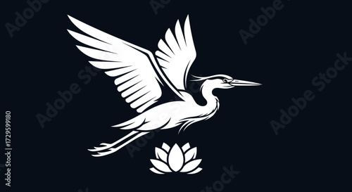 Elegant white heron bird soaring above a lotus flower in flight.