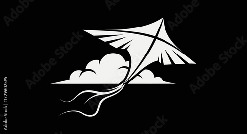 Elegant Kite Soaring Above Clouds Symbolizing Freedom and Joy.