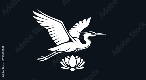 Elegant white heron flying above a blooming lotus flower.