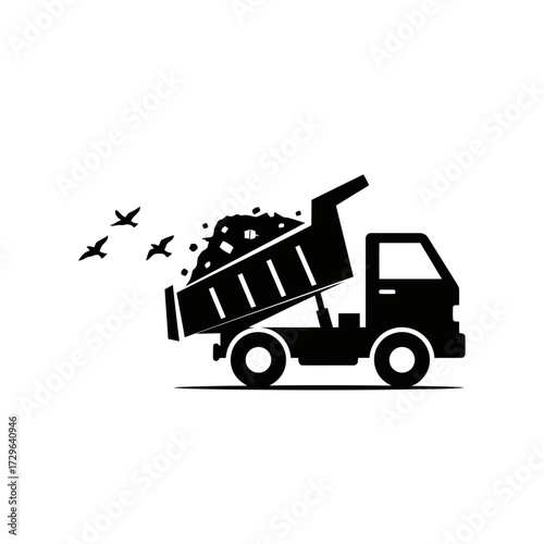 Black silhouette of a dump truck unloading dirt