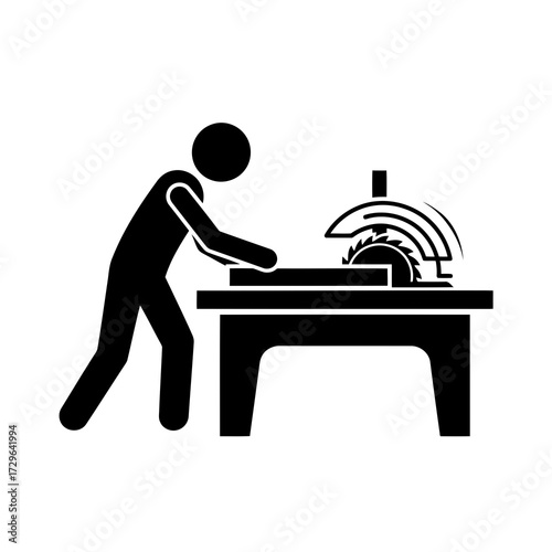 Man operating a table saw
