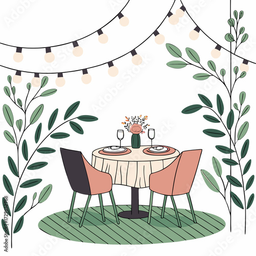 Romantic outdoor dining setup with a small round table set for two with wine glasses and a floral centerpiece surrounded by lush greenery and illuminated by charming string lights