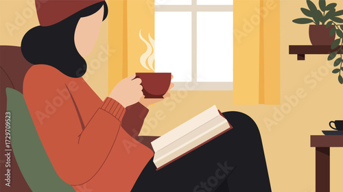 Woman enjoying a warm drink while reading a book in cozy setting