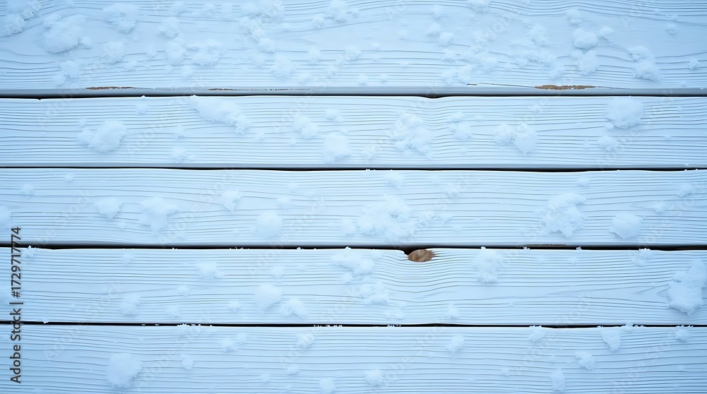 Naklejka premium Wooden planks covered with snow as background, top view. Winter season.