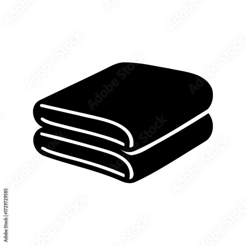 Solid black folded towels offer simple and clean aesthetic for bathroom design